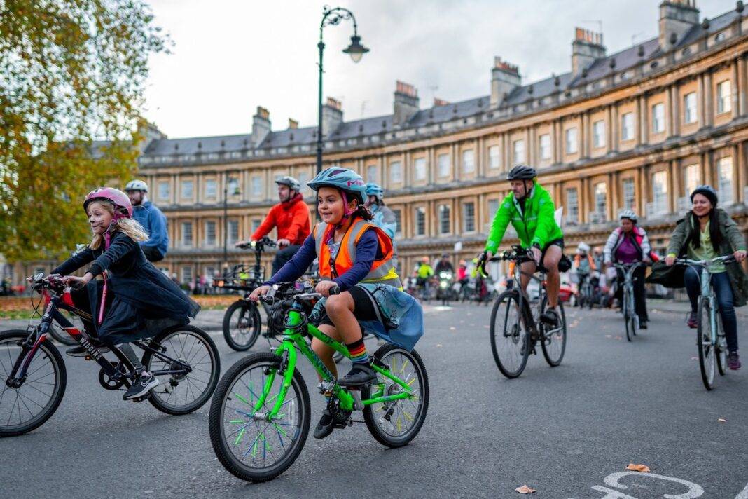 Biking through Bath, United Kingdom at the Kidical Mass event. — Photo by Jamie Bellinger