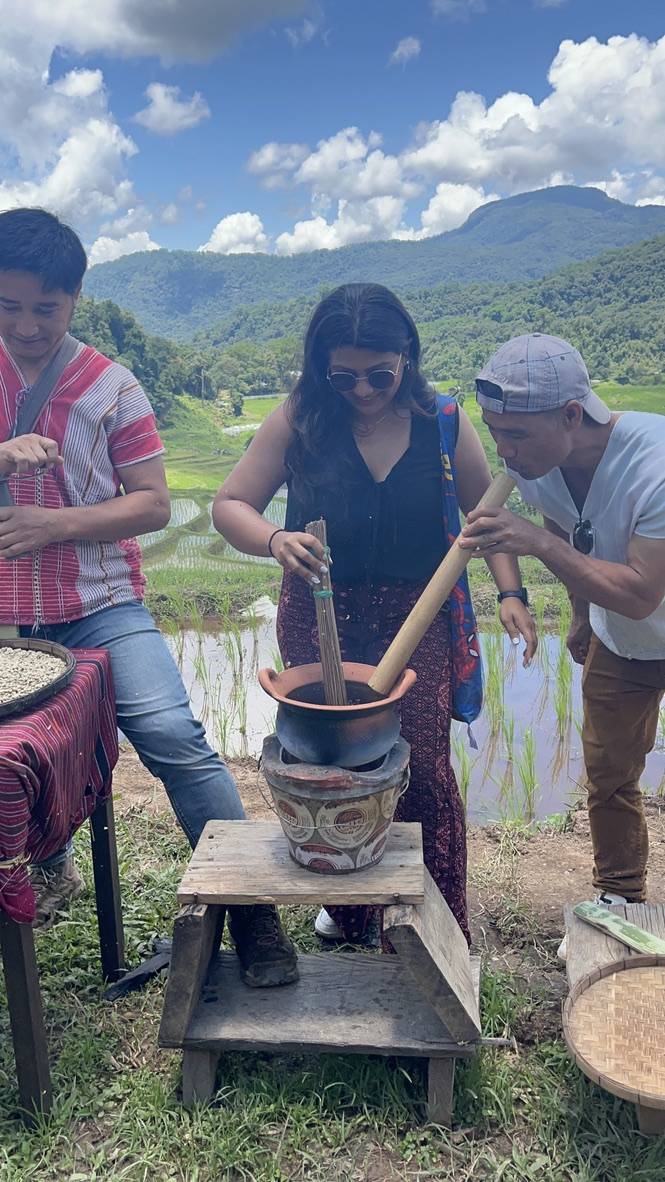 Writer Pooja Shah roasting coffee beans by hand.