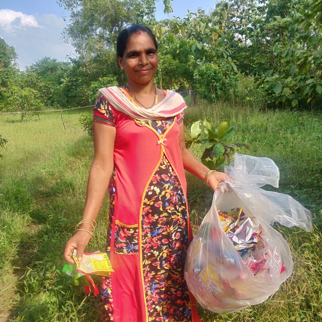 woman holding a bag of plastic