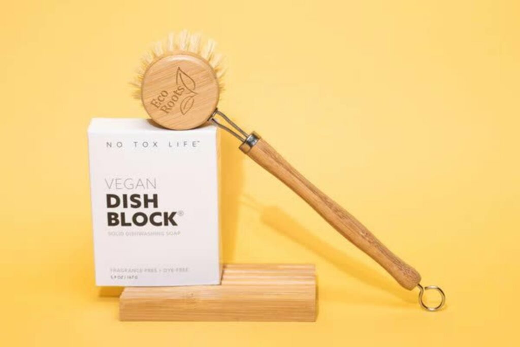 vegan dish block in front of yellow background